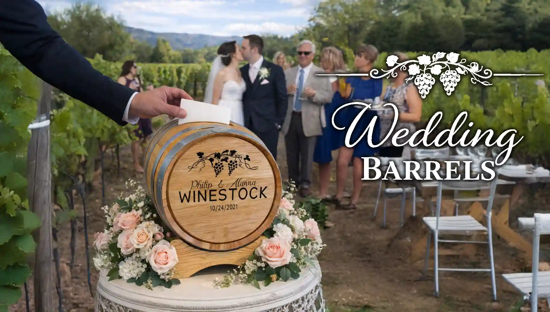 Custom engraved wedding barrel card holder at a vineyard wedding reception with guests in the background placing cards into the barrel.