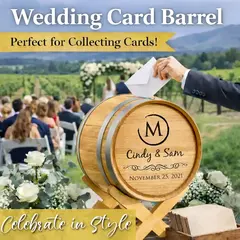 Personalized wooden wedding card holder barrel on crossbar stand used to collect guest envelopes and greeting cards at a wedding reception.