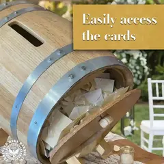 Back access door of personalized wedding card barrel opened to reveal stored wedding envelopes collected during the reception.