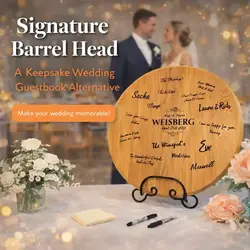 Signature barrel head wedding guestbook alternative where guests sign a real wine barrel lid personalized with couple names and wedding date.